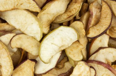 Dilimlenmiş elma arka plan, lezzetli, doğal kurumuş. Arka plan elma kurutulmuş. 