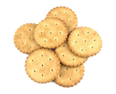 Beyaz arka plan üzerinde gıda kavramı izole kuru yuvarlak krakeri kurabiye
