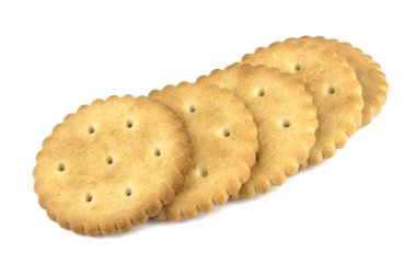 Beyaz arka plan üzerinde gıda kavramı izole kuru yuvarlak krakeri kurabiye