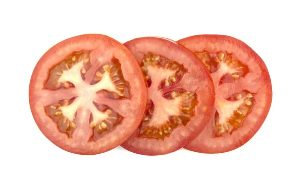 Rodajas de tomate aisladas sobre fondo blanco — Foto de Stock