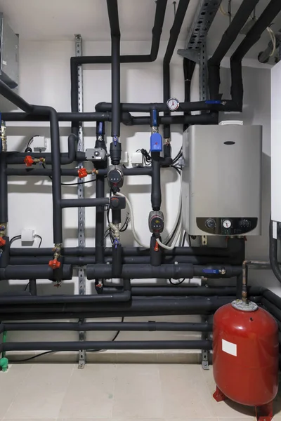 Home heating installations with boilers and pipes