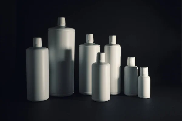 Botella Plástico Blanco Sobre Fondo Negro — Foto de Stock