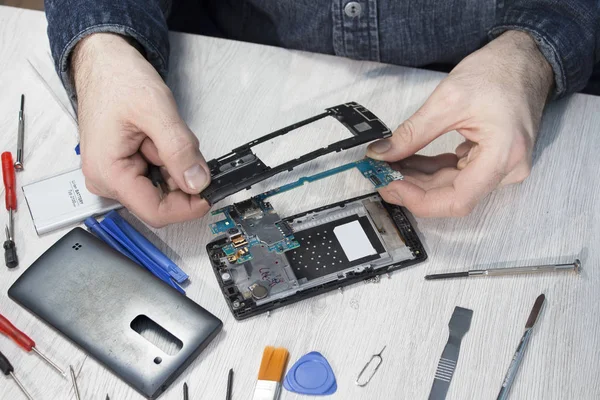 Man Hands Hold Elements Which Mobile Phone Built — Stock Photo, Image