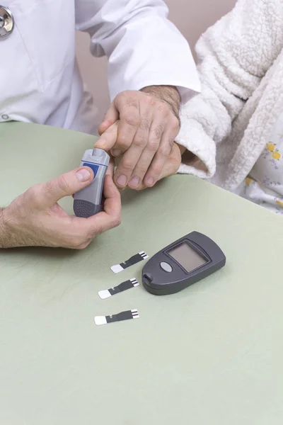 Diabetologist Doctor Holds Index Finger Very Old Woman Puncture Needles — Stock Photo, Image