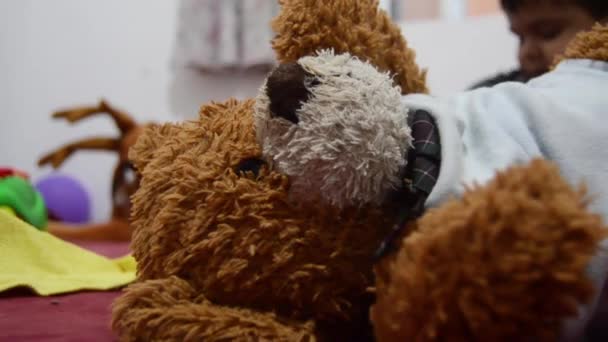 Teddy Bear Left Alone While Two Years Old Boy Playing — Stock Video