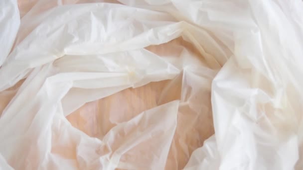 Timelapse stop motion, white biodegradable bag being filed buy organic waste — Stock Video