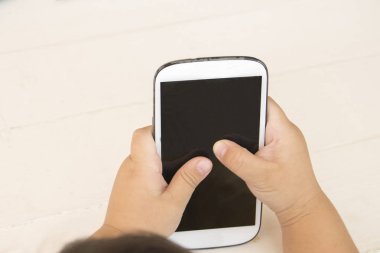 El çocukların cep telefonu tablo beyaz holding