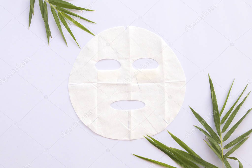 natural sheet mask for skin face from herbal bamboo on background white