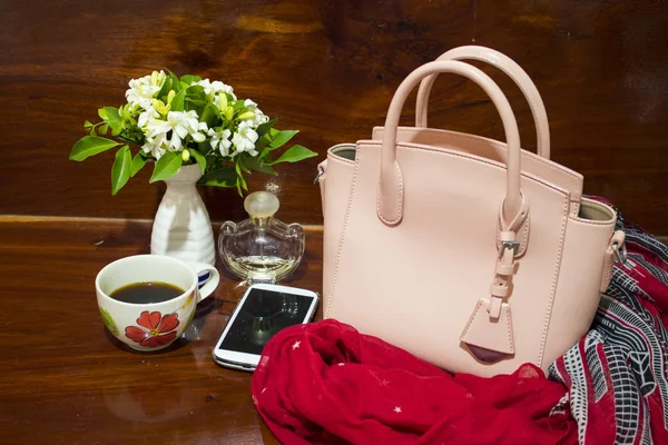 pink handbag collection colorful fashion for lifestyle woman relax and accessories on background wooden