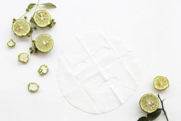 natural aroma sheet mask health care for skin face from herbal from kaffir lime essence face mask on background white