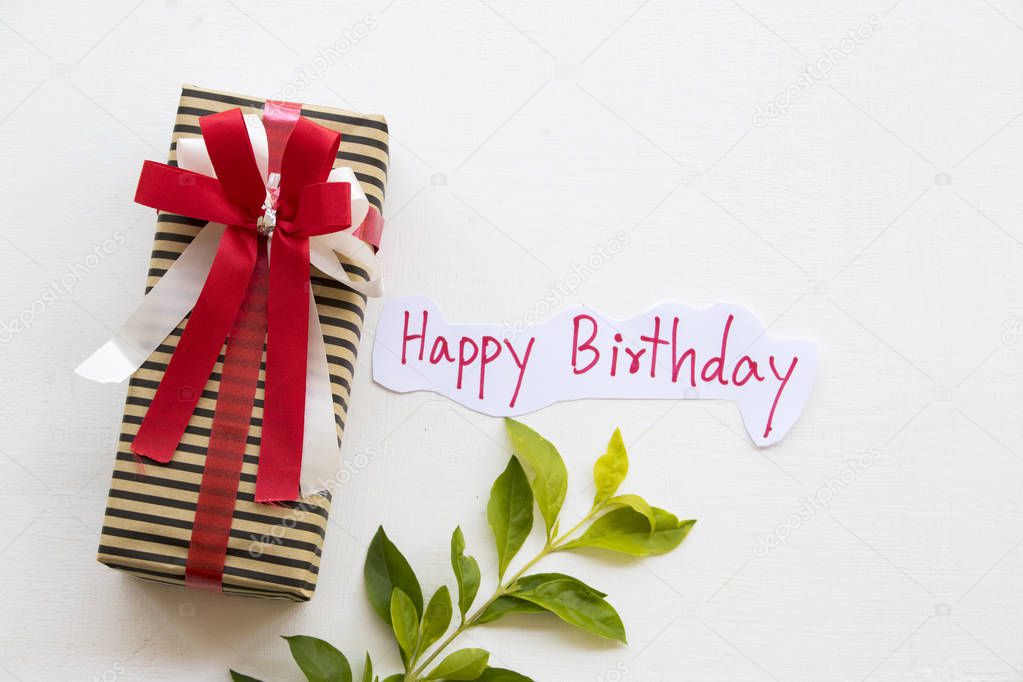 gift box with happy birthday message card handwriting for greeting special day on background white 
