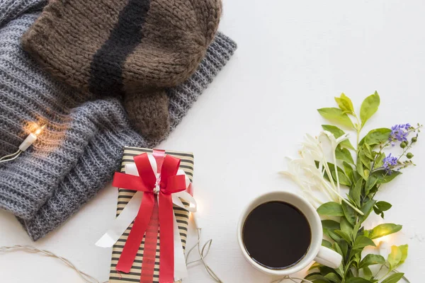 gift box for special in christmas and new year festival day with knitting wool scarf of lifestyle woman in winter season on background white