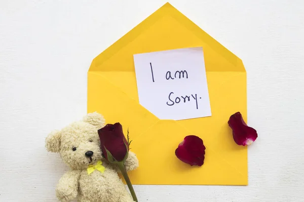 Sorry Message Card Handwriting Yellow Envelope Red Rose Flowers Teddy —  Fotos de Stock