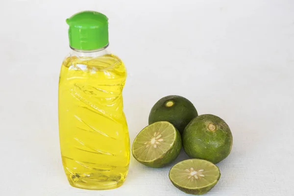 dish washing liquid extract herbal vegetable lemon health care cleaning dish and glass decoration on background white