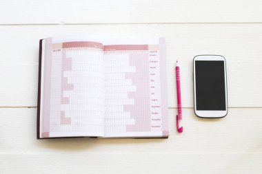 arka plan beyaz iş düzeni düz döşeme tarzı için dizüstü planlayıcısı ve cep telefonu 