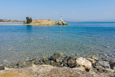 NEA POTEIDAIA, GREECE - 31 Mart 2019: Nea Poteidaia Kıyı Caddesi, Kassandra, Chalkidiki, Orta Makedonya, Yunanistan