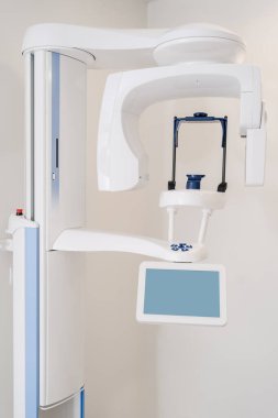 Modern dental scanning equipment clipart