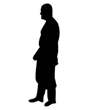 Siluet adam yan yan duruyor.