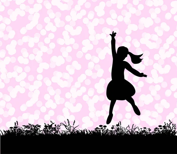 Çimlerin üzerinde zıplayan bir çocuğun silüeti.