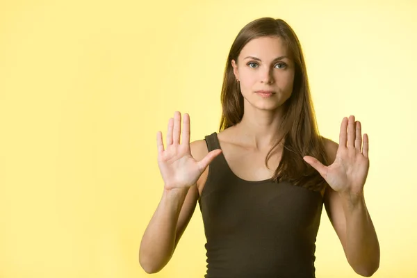 Beautiful Young Girl Her Hair Yellow Background Stop Sign Hands Stock Image