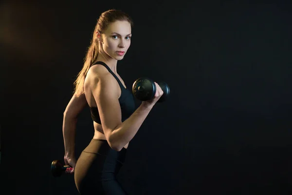 Beautiful Young Girl Training Dumbbell Shaking Her Biceps Black Background — Stock Photo, Image