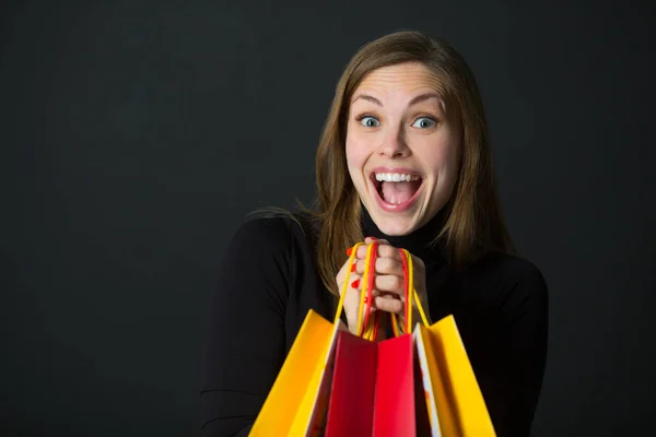 Beautiful Young Joyful Girl Packages Hands Black Background — Stock Photo, Image