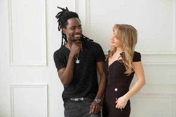 beautiful young couple man and woman on white background