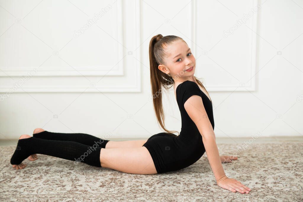 beautiful teenager girl playing sports indoors