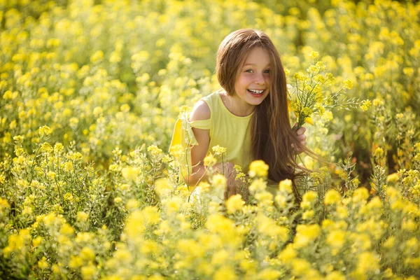 Teenage Girl Yellow Dress Picks Flowers Yellow Field Summer — Stock Photo, Image