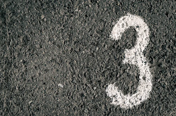 Asfalt yol doku arka plan kopya alanı ile boyalı sayısı 3 ile.