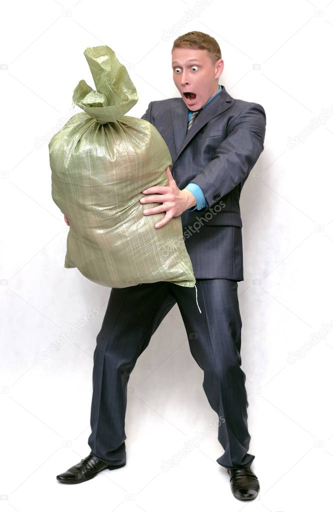 Cleaner man with garbage trash bag isolated on white background. Cleaning agency concept. Waste recycling business.