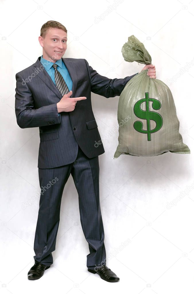 Business man with profit money bag. The lucky winner. Earnings from financial investments.