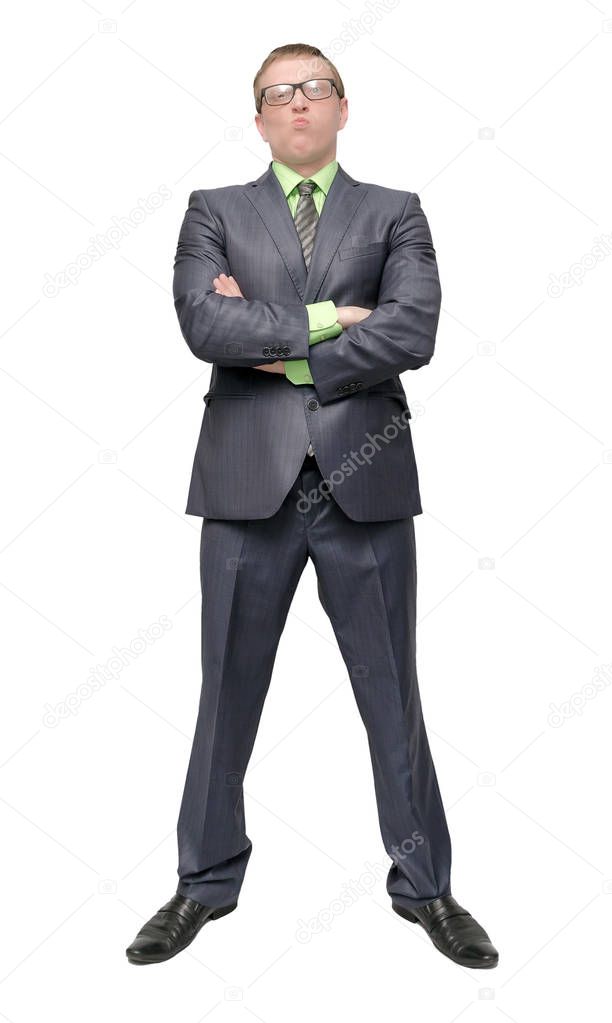 Angry arrogant businessman is standing with crossed arms isolated on white background. Dissatisfied and angry boss.