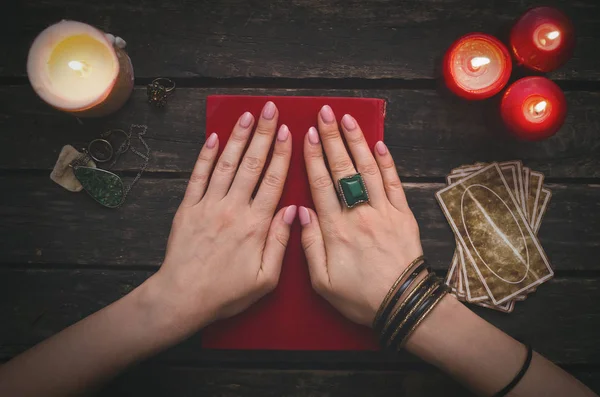 Book of magic and tarot cards on fortune teller table background. Futune reading concept. Divination.