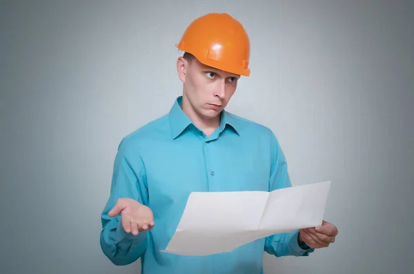 Confused Builder Construction Worker Holding Hand Plan Draft Document Isolated — Stock Photo, Image