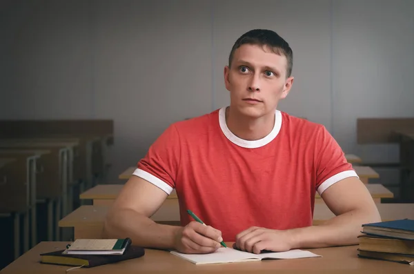 Serious Student Boy Writing Lecture Exam Work Workbook — Stock Photo, Image