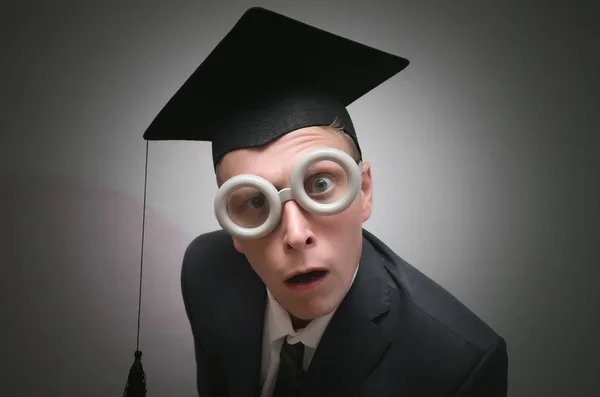 Estudante Graduado Boné Isolado Fundo Cinza Conceito Educação — Fotografia de Stock