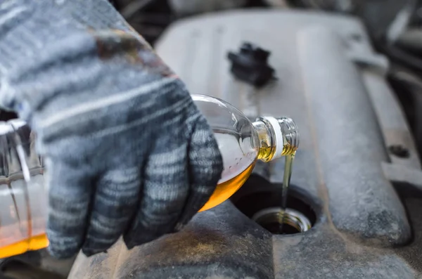 Car Mechanic Pouring New Motor Oil Engine — Stock Photo, Image