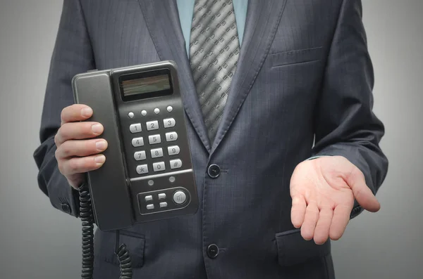 Telefono Nella Mano Uomo Affari Isolato Sullo Sfondo Grigio Aiuti — Foto Stock