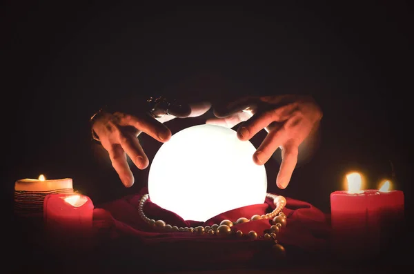 Crystal ball on the magic table background. Future reading.