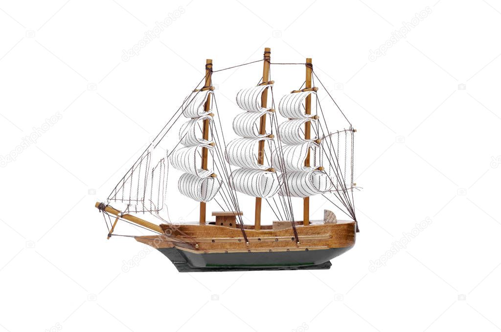 Sail ship toy isolated on the white background.