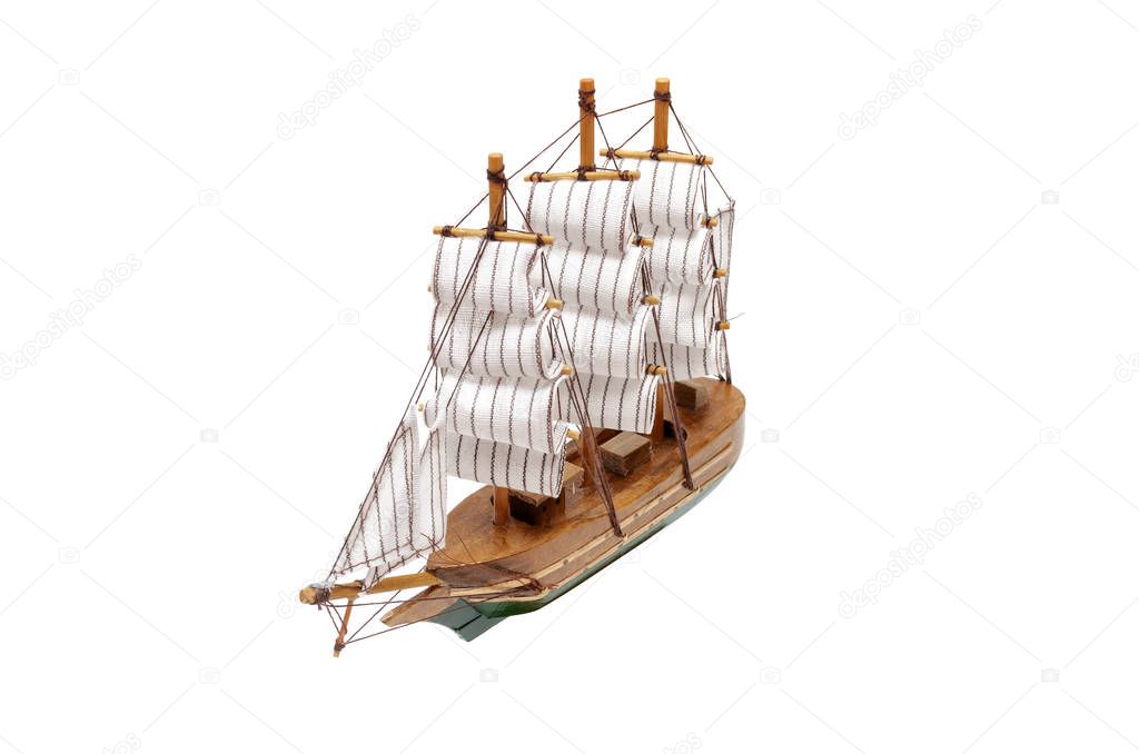 Sail ship toy isolated on the white background.