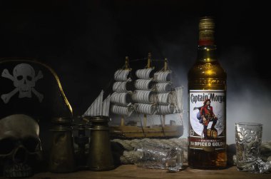 Kurgan, Russia January 20, 2019: Rum - Captain Morgan spiced gold original on the table. clipart