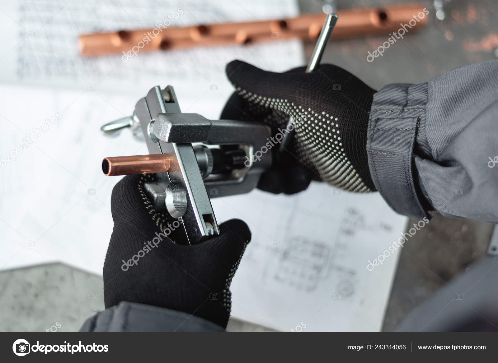 Engineer Holding Pipe Rammer Tool Pipework Stock Photo by ©ndefender