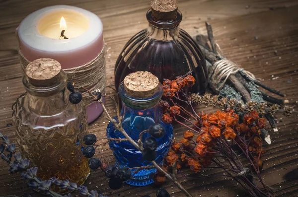 Magic potion. Alternative herbal medicine. Shaman table with copy space. Druidism concept. Witch doctor desk background.