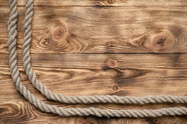 Kahverengi ahşap zemin zemin üzerinde kopya alanı olan ip.