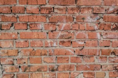 Turuncu tuğla duvar arka plan dokusu. Kırık tuğlalar..