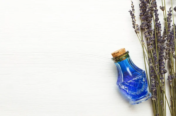 Dry Lavender Branches Bottle Blue Medical Tincture White Wooden Background — Stock Photo, Image