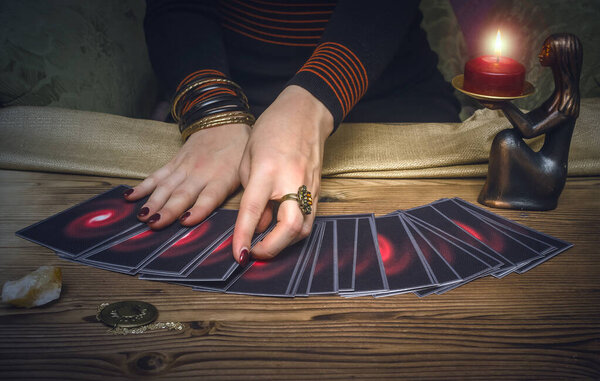 Tarot cards and fortune teller. Future reading concept.