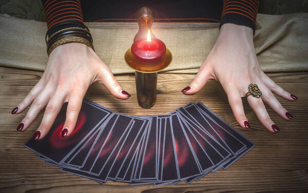 Tarot cards and fortune teller. Future reading concept.